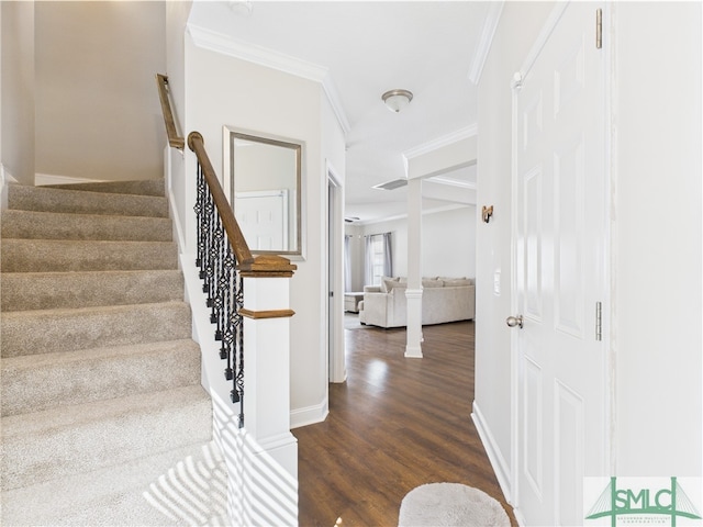 1246 Cypress Fall Cir, Hinesville, GA 31313 - stairs with crown molding, baseboards, and wood finished floors