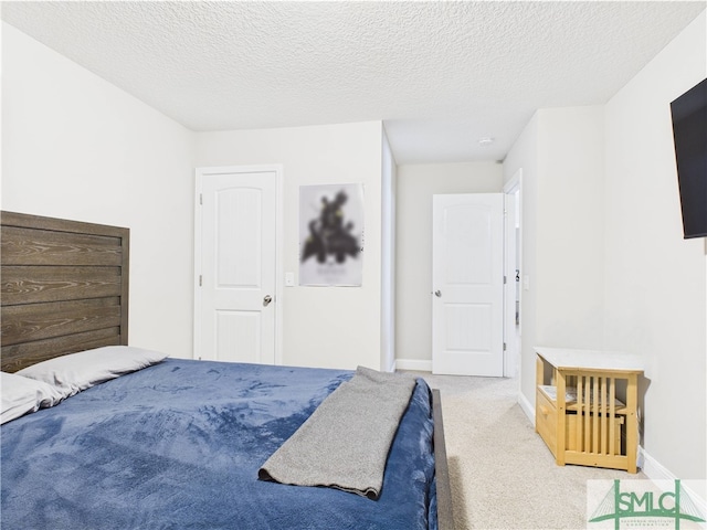 1246 Cypress Fall Cir, Hinesville, GA 31313 - carpeted bedroom featuring baseboards and a textured ceiling