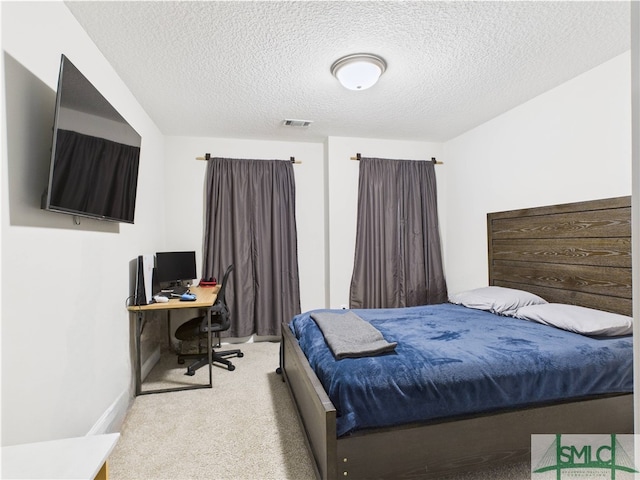 1246 Cypress Fall Cir, Hinesville, GA 31313 - bedroom with a textured ceiling, visible vents, baseboards, and carpet