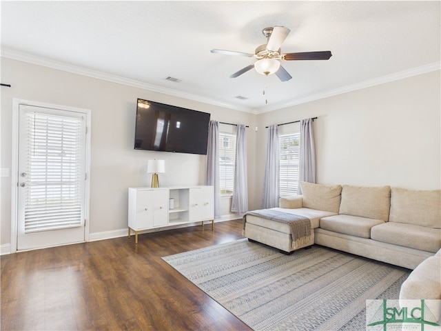 1246 Cypress Fall Cir, Hinesville, GA 31313 - living room featuring ceiling fan, baseboards, wood finished floors, visible vents, and ornamental molding