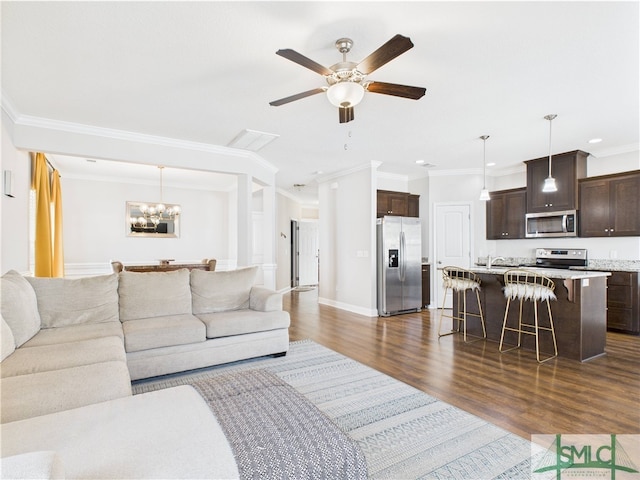 1246 Cypress Fall Cir, Hinesville, GA 31313 - living area featuring ceiling fan, crown molding, dark wood finished floors, baseboards, and recessed lighting
