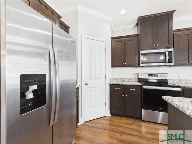 1246 Cypress Fall Cir, Hinesville, GA 31313 - kitchen with dark wood-type flooring, ornamental molding, dark brown cabinetry, and stainless steel appliances