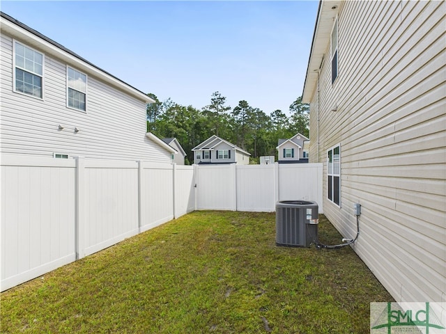 1246 Cypress Fall Cir, Hinesville, GA 31313 - view of yard with a fenced backyard and central air condition unit