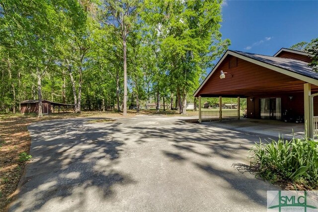 178 Country Way, Springfield, GA 31329 - exterior space featuring aphalt driveway and a carport