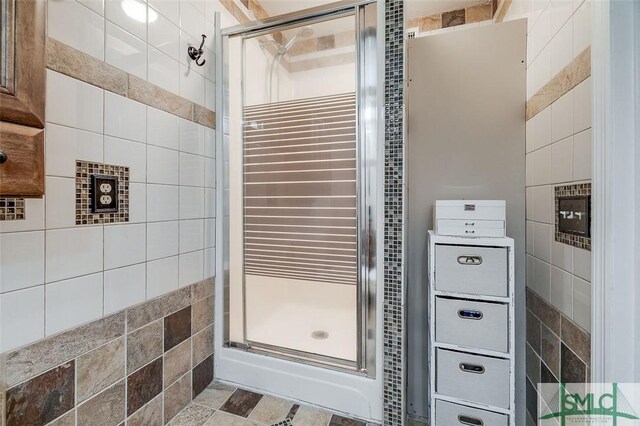 178 Country Way, Springfield, GA 31329 - bathroom with a shower stall and tile walls