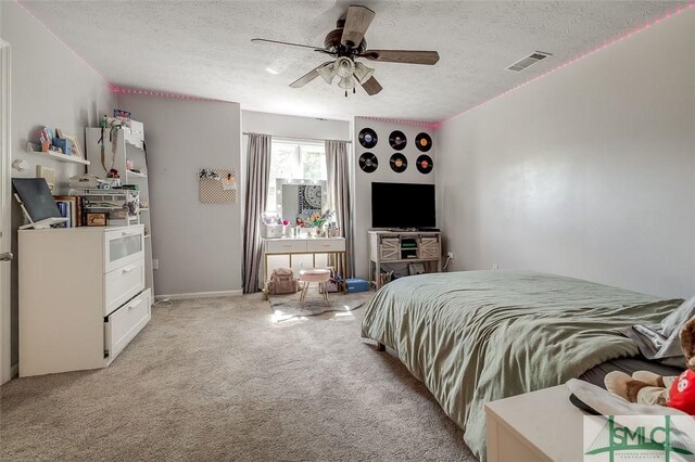 178 Country Way, Springfield, GA 31329 - bedroom featuring ceiling fan, light carpet, a textured ceiling, and visible vents
