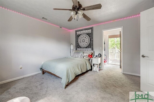 178 Country Way, Springfield, GA 31329 - bedroom with visible vents, baseboards, ceiling fan, a textured ceiling, and carpet flooring