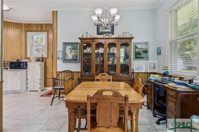 1508 Miller Ave, Tybee Island, GA 31328 - dining area featuring crown molding and wooden walls