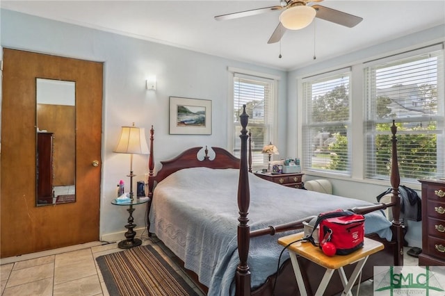 1508 Miller Ave, Tybee Island, GA 31328 - bedroom featuring light tile patterned floors, baseboards, and a ceiling fan