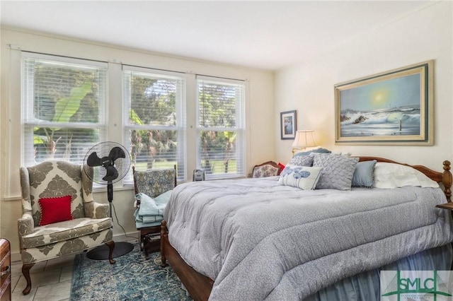 1508 Miller Ave, Tybee Island, GA 31328 - bedroom featuring baseboards and tile patterned flooring