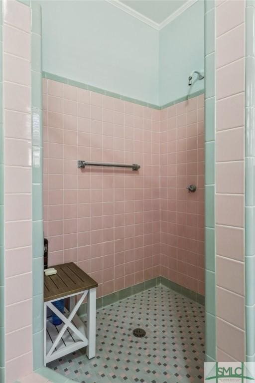 1508 Miller Ave, Tybee Island, GA 31328 - full bathroom with crown molding, tile walls, and tiled shower