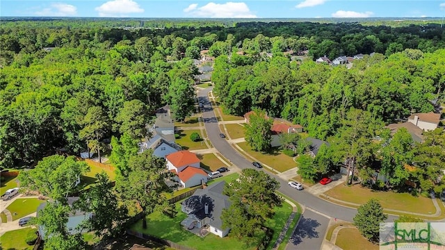 aerial view with a view of trees and a residential view