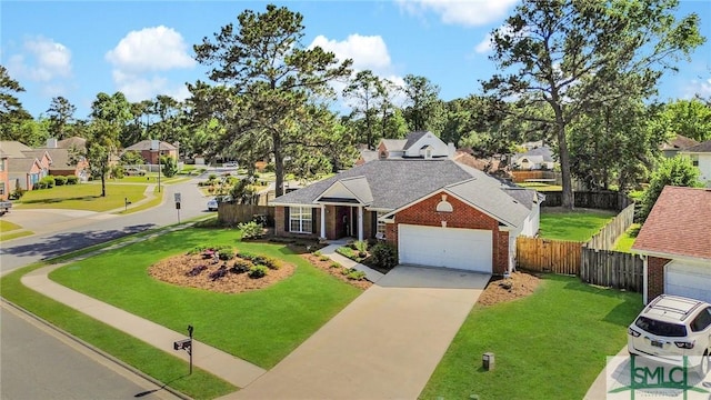 traditional-style home featuring fence, driveway, a front lawn, and brick siding
