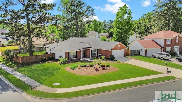 ranch-style home with brick siding, fence, a front yard, and concrete driveway