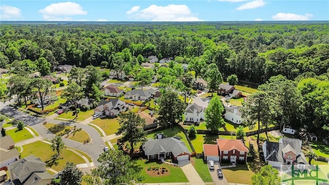 bird's eye view with a residential view and a wooded view