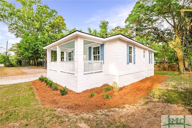 view of home's exterior featuring a porch