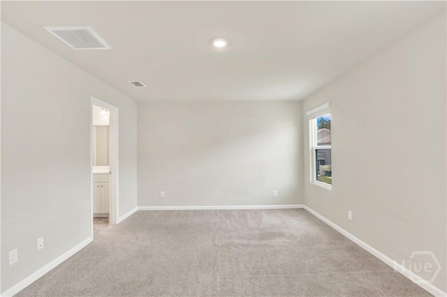 132 Congo Ct, Pooler, GA 31322 - spare room with light colored carpet, baseboards, and recessed lighting