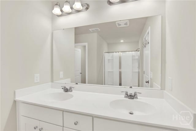 132 Congo Ct, Pooler, GA 31322 - full bath featuring double vanity and a shower stall