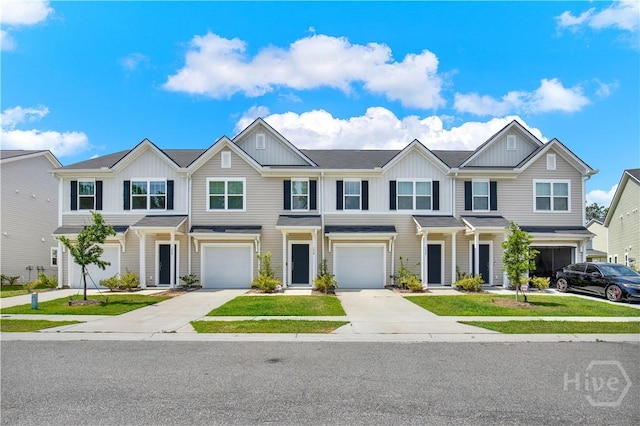 132 Congo Ct, Pooler, GA 31322 - multi unit property with board and batten siding, driveway, an attached garage, and a front lawn