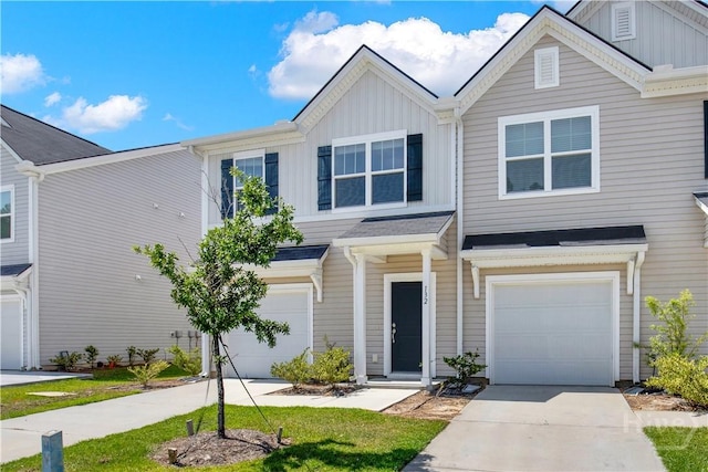 132 Congo Ct, Pooler, GA 31322 - view of property with a garage, board and batten siding, and concrete driveway