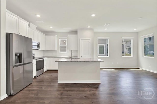 132 Congo Ct, Pooler, GA 31322 - kitchen with stainless steel appliances, a kitchen island with sink, a sink, dark wood finished floors, and recessed lighting