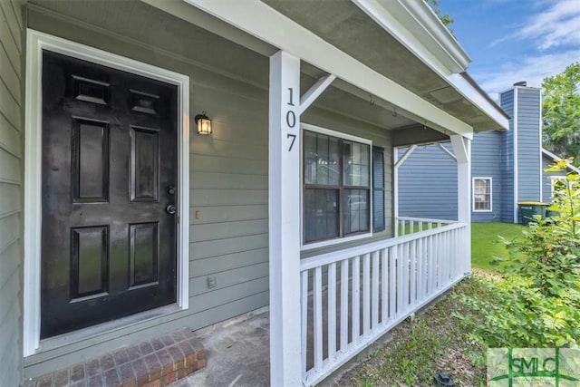 entrance to property with a porch