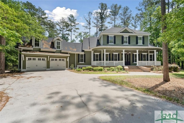 80 Hickory St, Richmond Hill, GA 31324 - view of front of home with a porch and concrete driveway