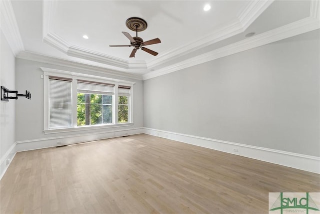 80 Hickory St, Richmond Hill, GA 31324 - unfurnished room with a ceiling fan, a raised ceiling, wood finished floors, and ornamental molding