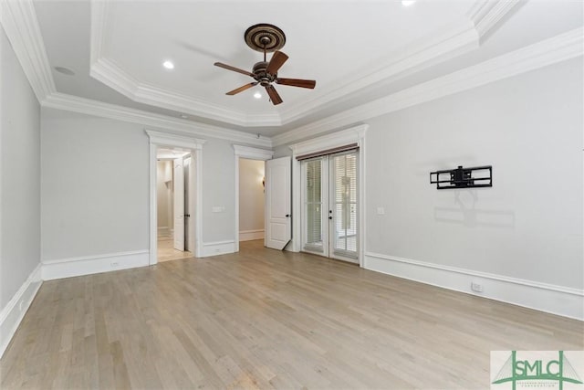 80 Hickory St, Richmond Hill, GA 31324 - unfurnished bedroom featuring ornamental molding, baseboards, recessed lighting, a raised ceiling, and light wood-style flooring