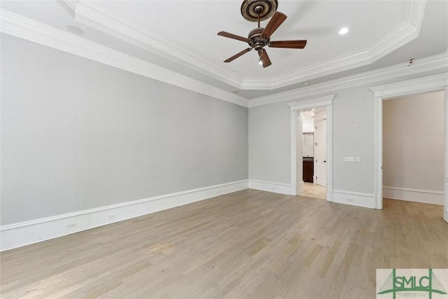 80 Hickory St, Richmond Hill, GA 31324 - unfurnished bedroom featuring baseboards, light wood finished floors, ornamental molding, a tray ceiling, and recessed lighting
