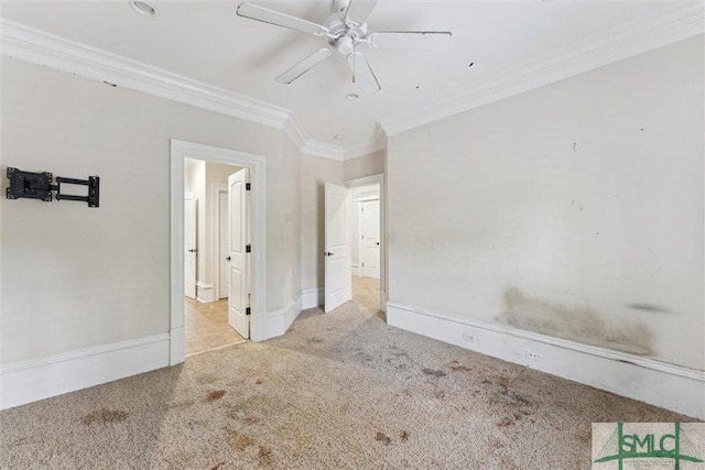 80 Hickory St, Richmond Hill, GA 31324 - unfurnished bedroom with a ceiling fan, baseboards, ornamental molding, ensuite bathroom, and carpet