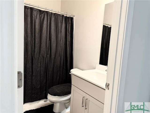132 Cubbedge Dr, Rincon, GA 31326 - bathroom with vanity, toilet, and a shower with curtain
