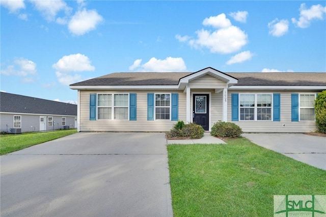 single story home with central air condition unit, a front yard, and concrete driveway