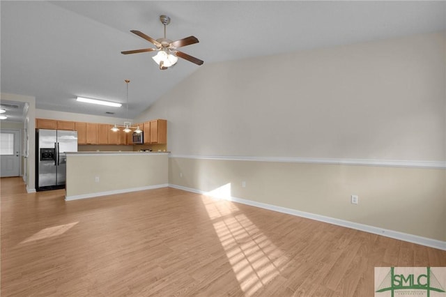 unfurnished living room with baseboards, ceiling fan, and light wood finished floors