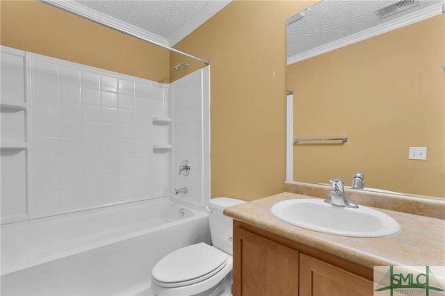 bathroom featuring visible vents, crown molding, vanity, toilet, and a textured ceiling