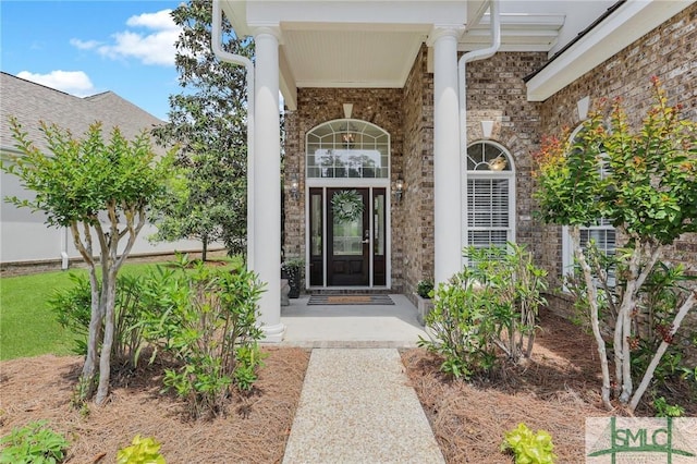 5 Lazy Hammock Ct, Savannah, GA 31419 - property entrance with covered porch and brick siding