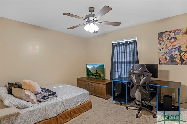 carpeted bedroom with a ceiling fan