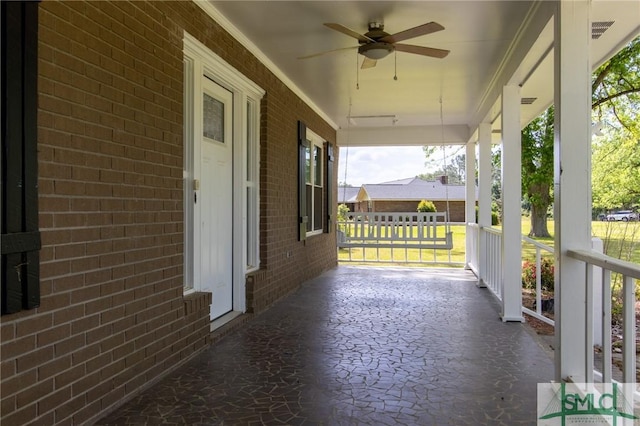 view of patio featuring a ceiling fan and covered porch