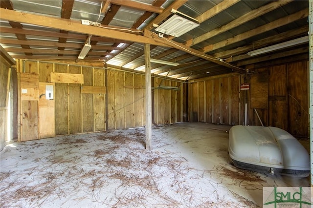 misc room with a garage