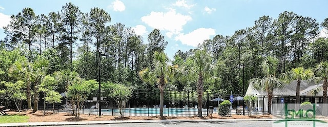 166 Benelli Dr, Pooler, GA 31322 - view of swimming pool featuring fence