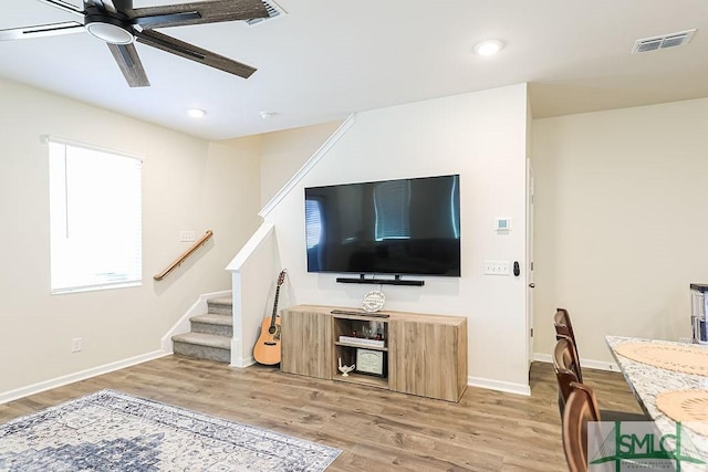 166 Benelli Dr, Pooler, GA 31322 - living room with visible vents, stairs, ceiling fan, recessed lighting, and light wood-style flooring