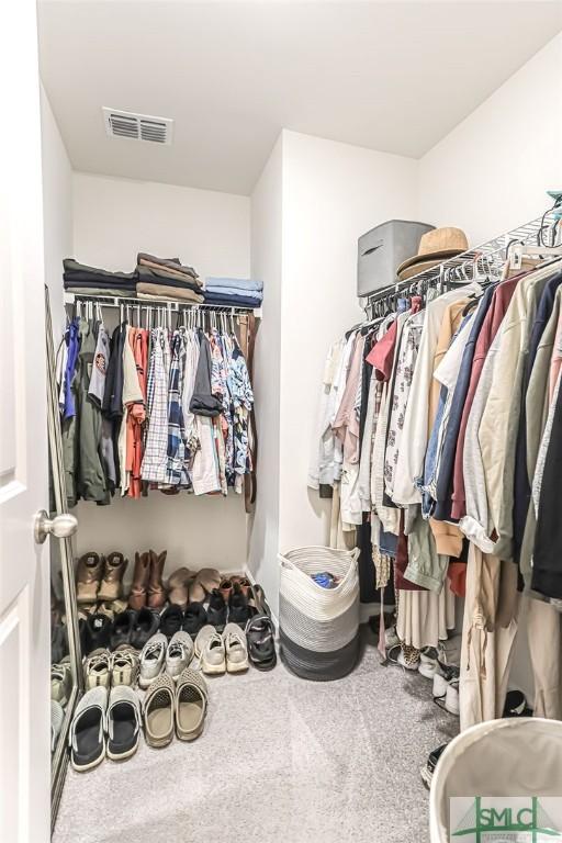166 Benelli Dr, Pooler, GA 31322 - walk in closet featuring carpet and visible vents