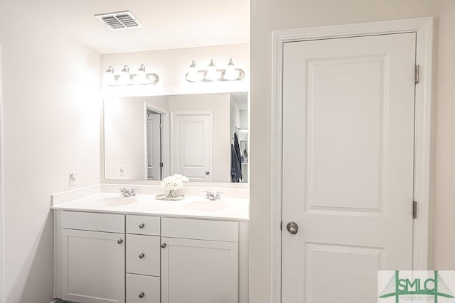 166 Benelli Dr, Pooler, GA 31322 - bathroom featuring a sink, a closet, double vanity, and visible vents