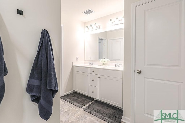 166 Benelli Dr, Pooler, GA 31322 - bathroom with visible vents, a sink, and double vanity