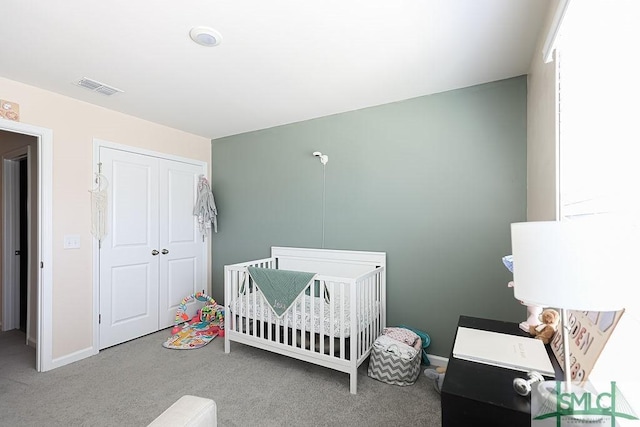 166 Benelli Dr, Pooler, GA 31322 - bedroom with visible vents, a nursery area, baseboards, a closet, and carpet