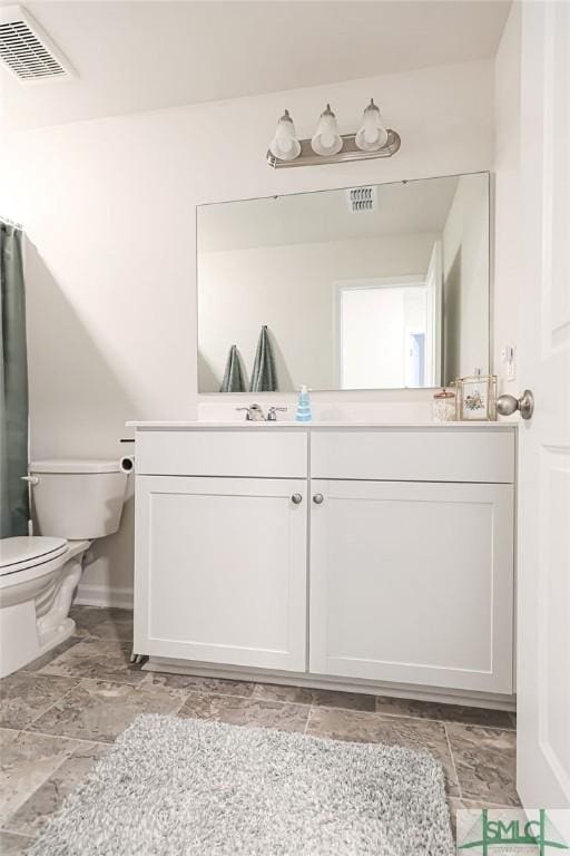 166 Benelli Dr, Pooler, GA 31322 - bathroom with visible vents, baseboards, toilet, and vanity