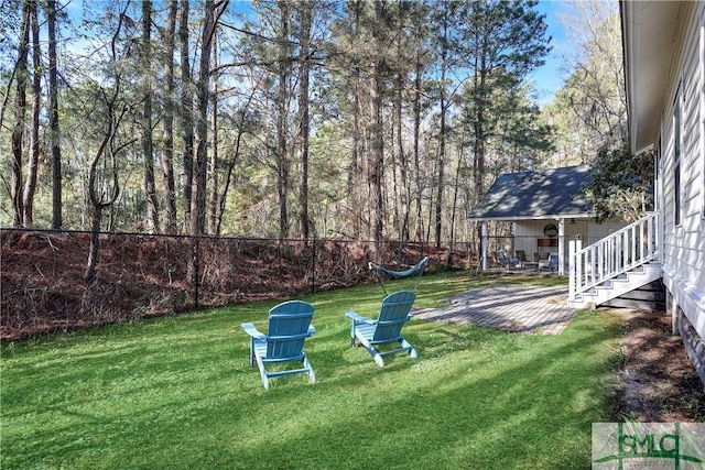view of yard with fence