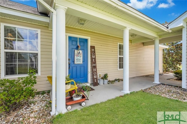 entrance to property with a porch