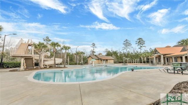 pool featuring a patio area