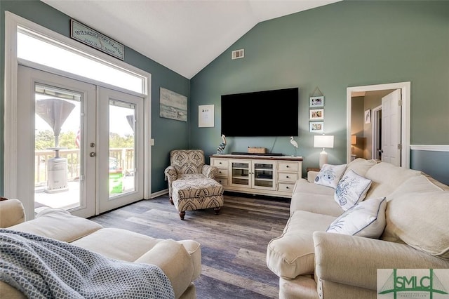 living room with french doors, vaulted ceiling, wood finished floors, and visible vents